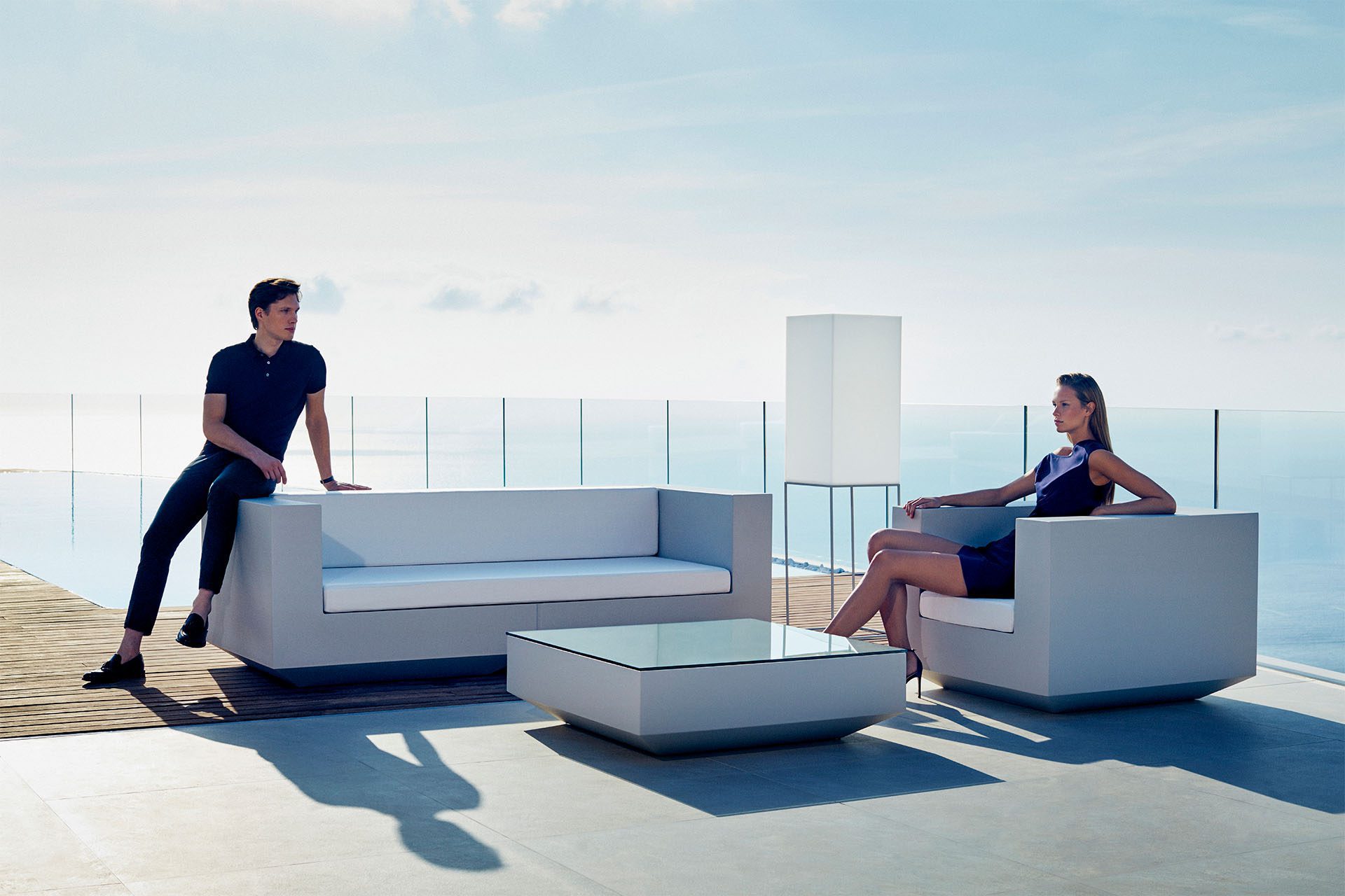 Vela outdoor sofa, armchair, table and lamp designed by Ramon Esteve Vondom