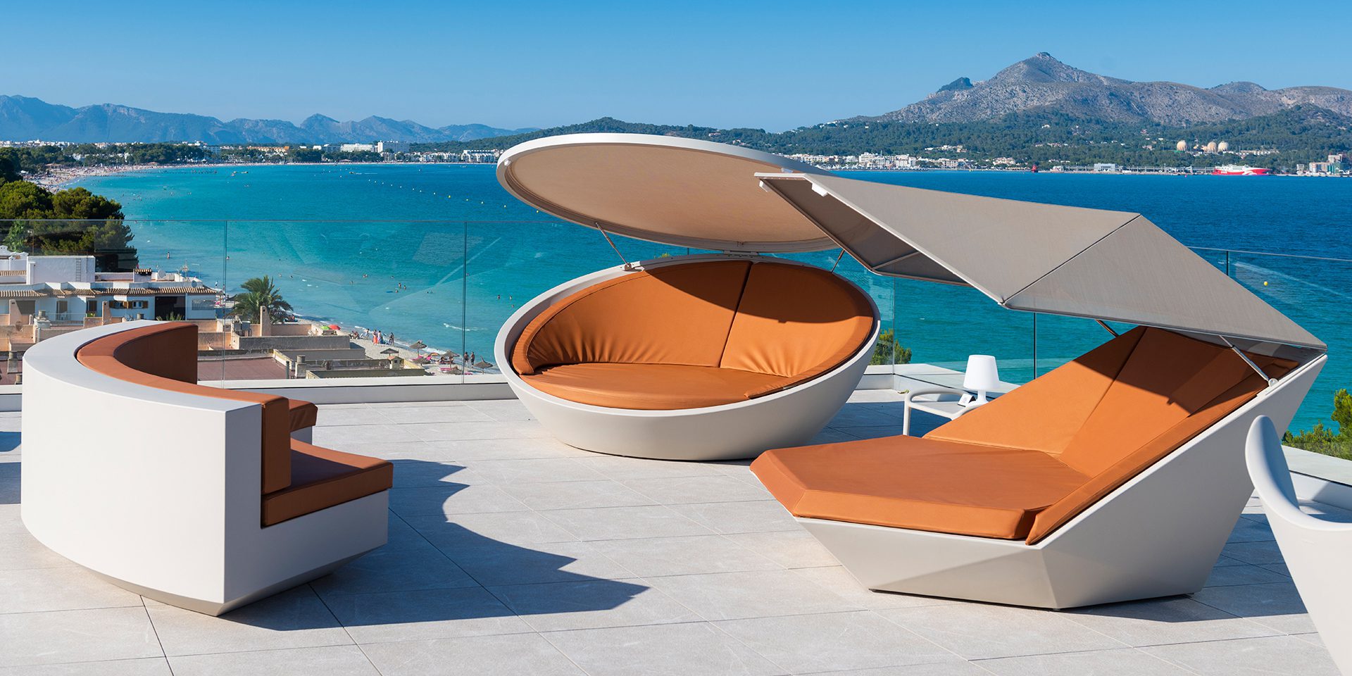 Outdoor contract furniture Faz and Ulm daybeds and Vela sofa, hospitality furniture by Vondom